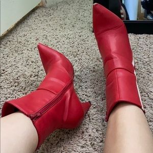 Red boots with white stripe